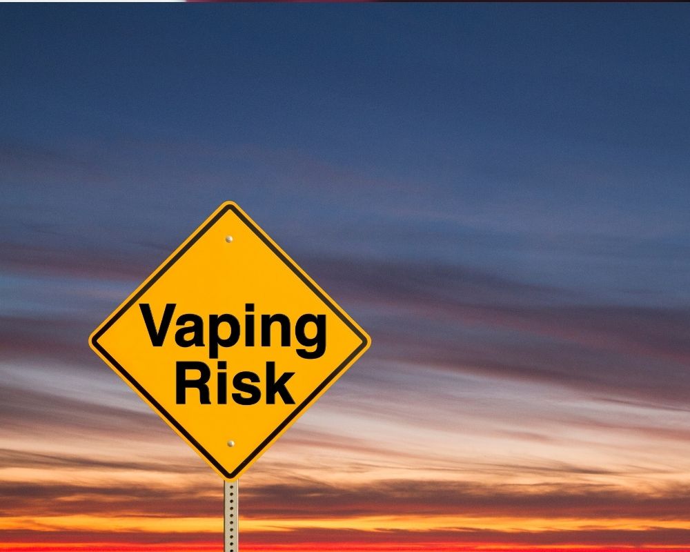 Road sign with text "vaping risk"
