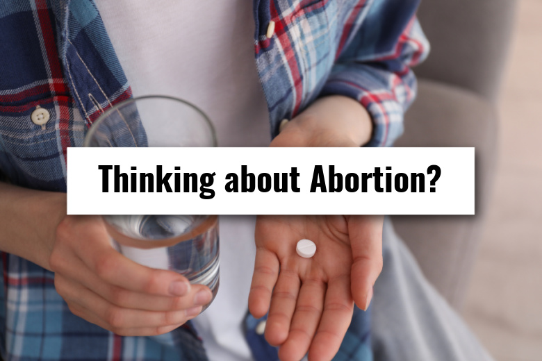 Oval graphic with image of woman holding a pill in her hand and a text overlay button reading "Thinking about Abortion?"