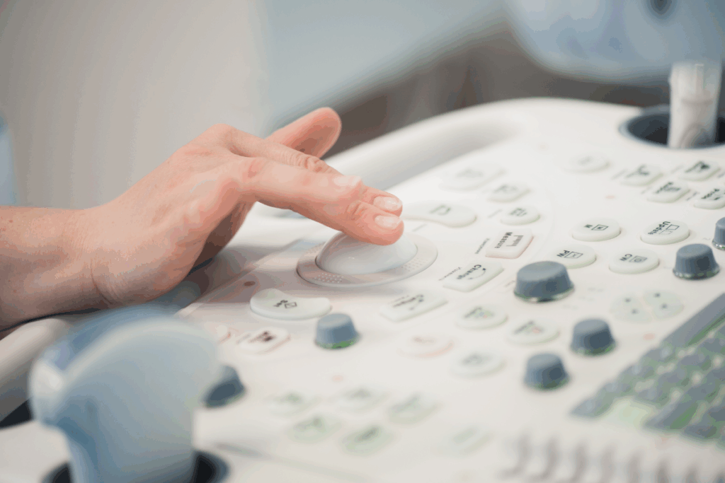 Provider using a sonogram machine